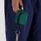 model holding cypress mini baggu fanny pack keychain