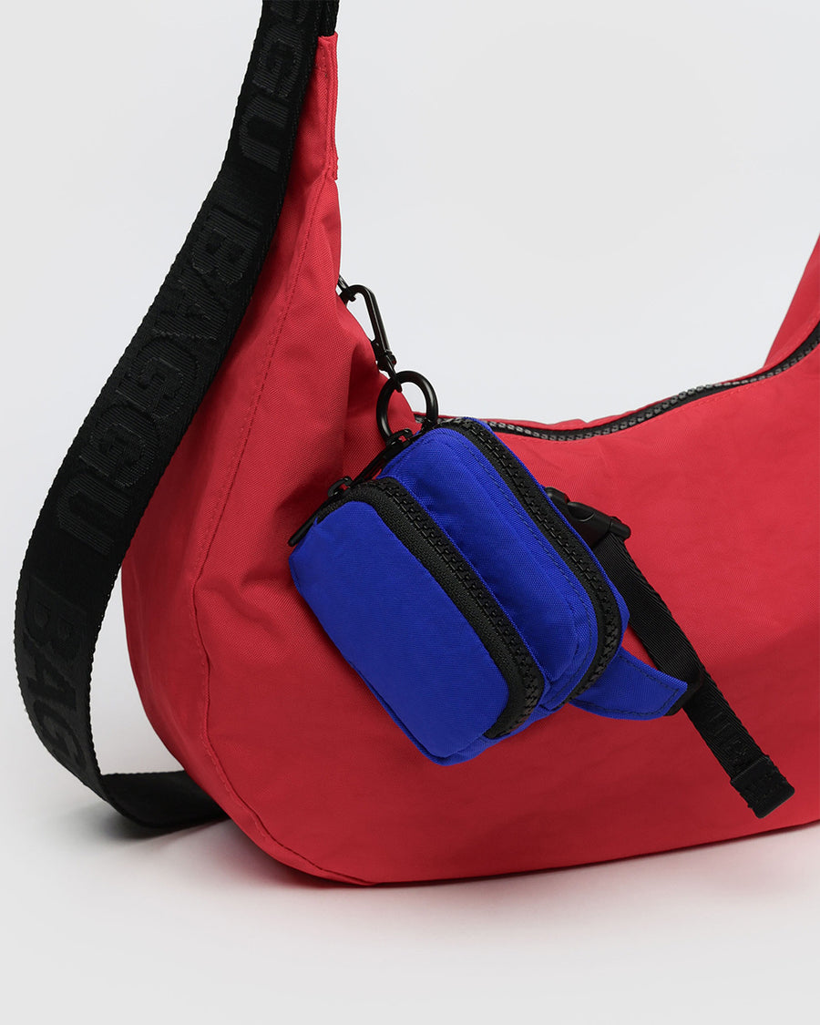 lapis mini baggu fanny pack keychain on a bag