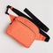 coral orange fanny pack with black strap