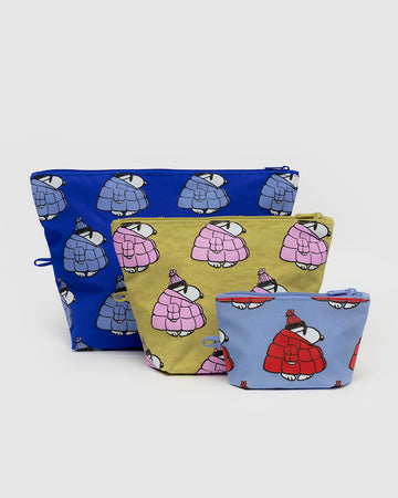 set of three go pouch set: red snoopy puffer, pink snoopy puffer, and blue snoopy puffer