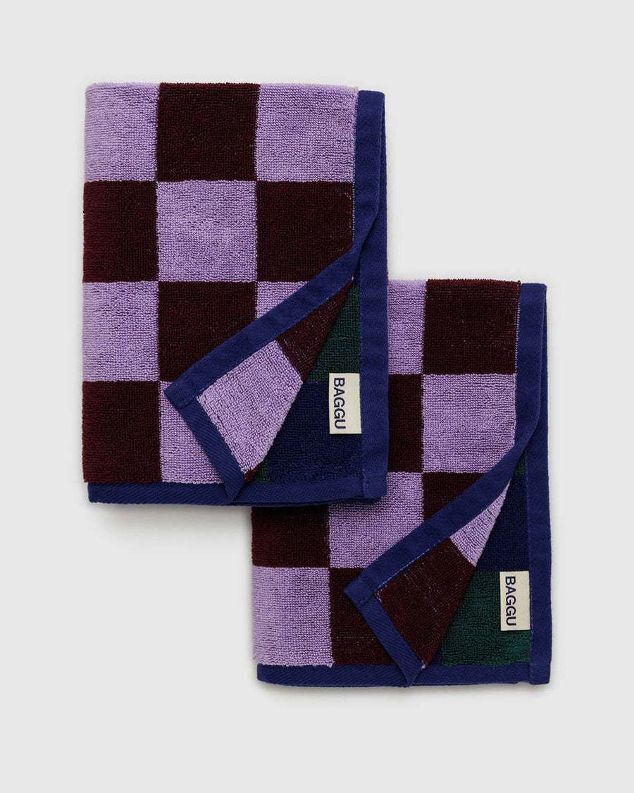 folded set of two double sides hand towels with lavender and brown checker and dark green and navy checkers