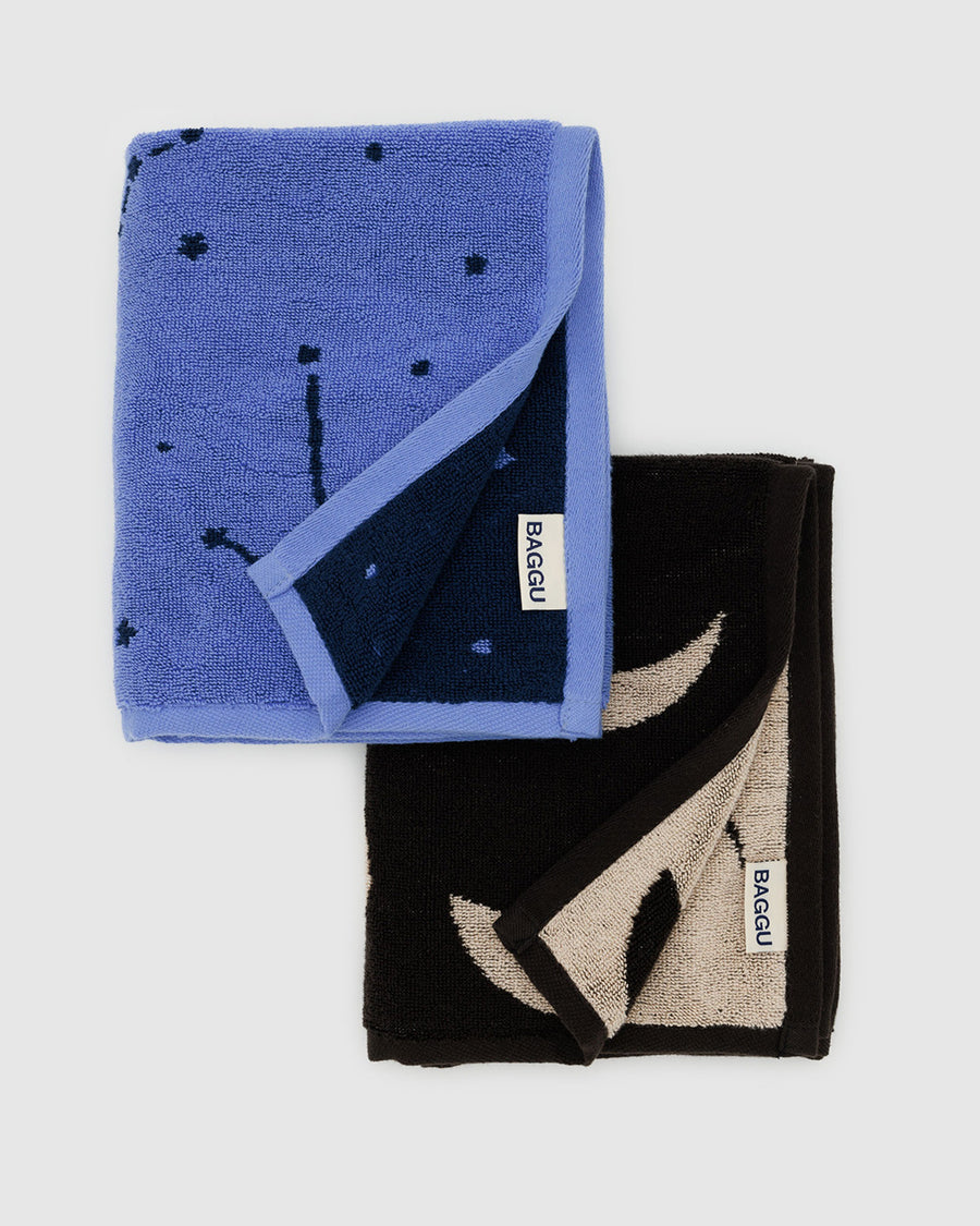 set of two reversible hand towels: periwinkle constellation and black moon phases