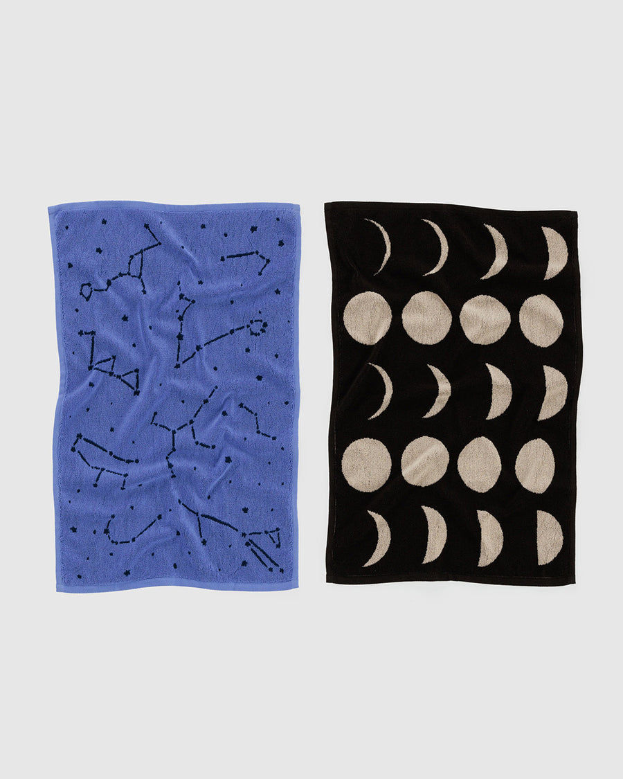 set of two reversible hand towels: periwinkle constellation and black moon phases