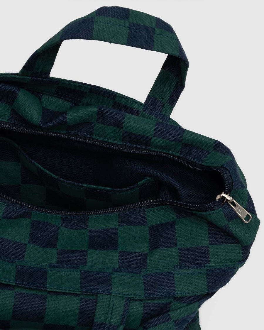 inside pocket of navy and dark green horizontal zip duck bag