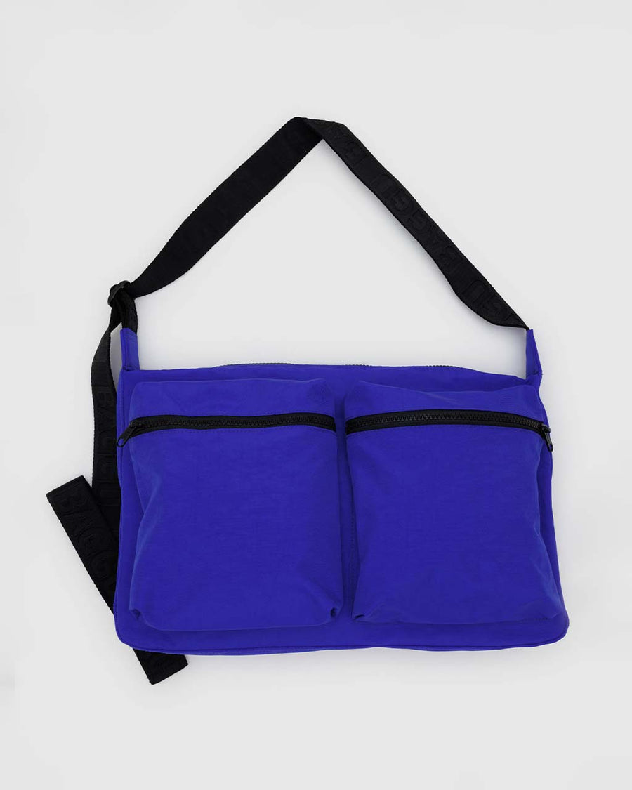 bright blue cargo crossbody with two large zipper pockets in the front