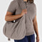 model carrying taupe nylon large crescent bag