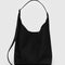 large black nylon sling bag with adjustable strap