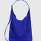 large bright blue nylon sling bag with adjustable strap