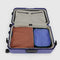 set of two large packing cubes: cornflower, terracotta, and dark green color block inside suitcase