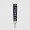 black baggu keychain with white 'baggu' font