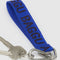 cobalt keychain with dark blue 'baggu' font  with keys attached