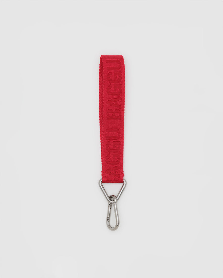 red keychain with red 'baggu' 