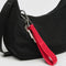 red keychain with red 'baggu' on purse