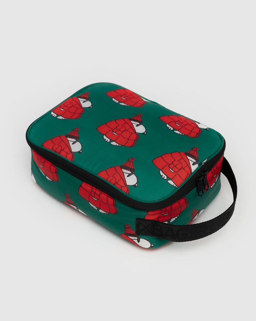 green lunch box with snoopy in a red puffer coat