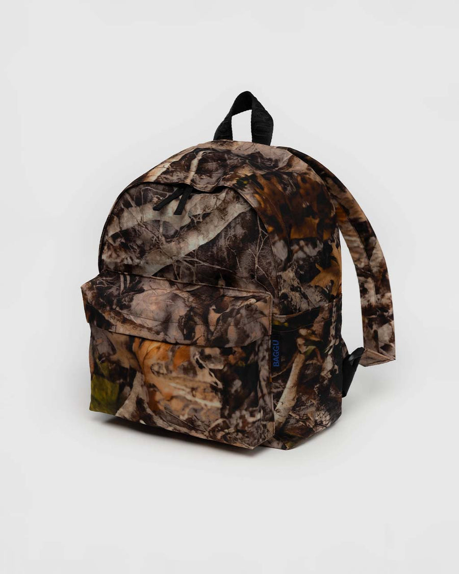 realistic forest print nylon backpack with large zipper compartment, front zipper pocket, and side drink holder