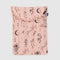 pink 13 in. puffy laptop sleeve with various icons (moon, ballet shoes, spider, moons, snake, roses)