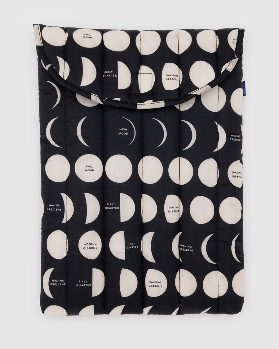 black 16 inch puffy laptop sleeve with white moon phase print