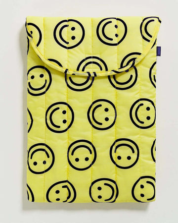 yellow 16 in. laptop sleeve with black smiley face print
