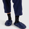 model wearing navy blue puffer slippers with white constellation print