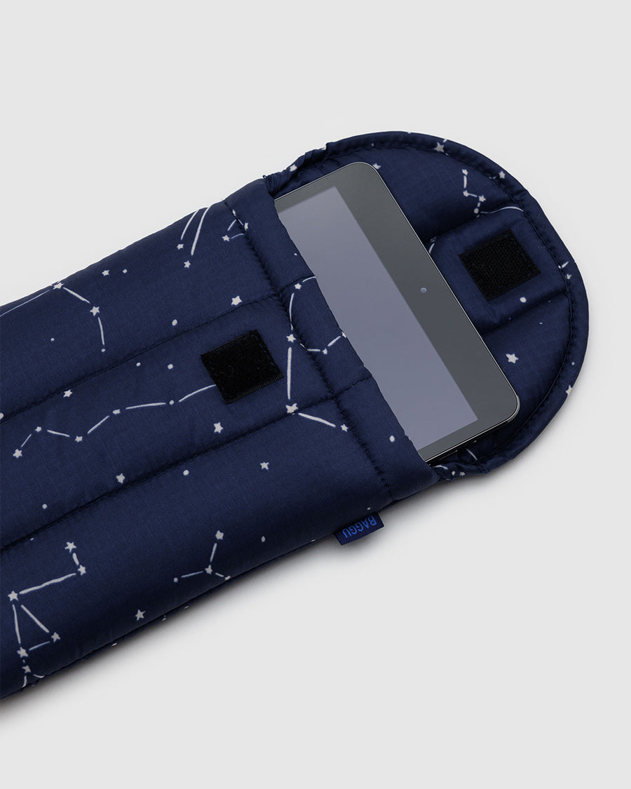 navy 8 inch puffy tablet sleeve with white constellation print with tablet sticking out