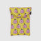 yellow 8 inch puffy tablet sleeve with snoopy wearing a pink puffer coat and hat