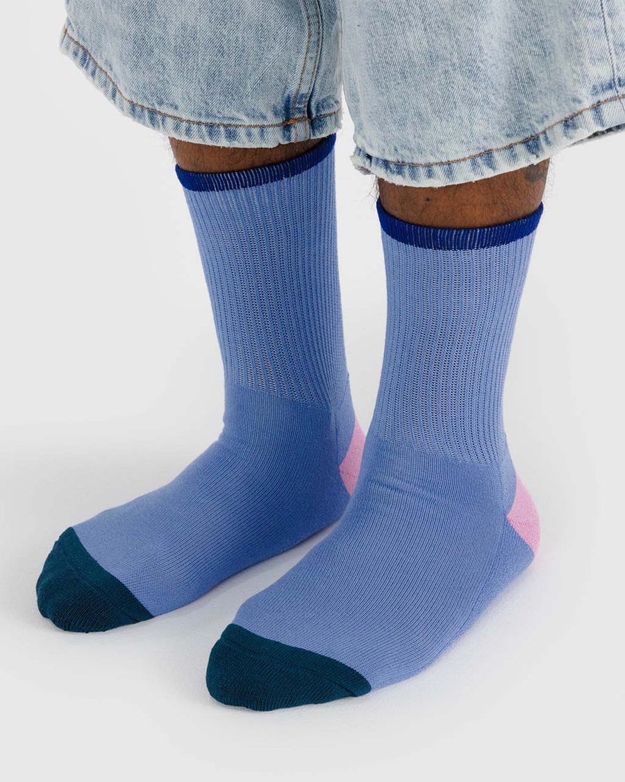 model wearing cornflower ribbed socks with navy and pink trim