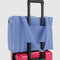 cornflower small cloud carry on bag on a suitcase