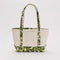 tan small heavyweight tote with realistic daisy field print