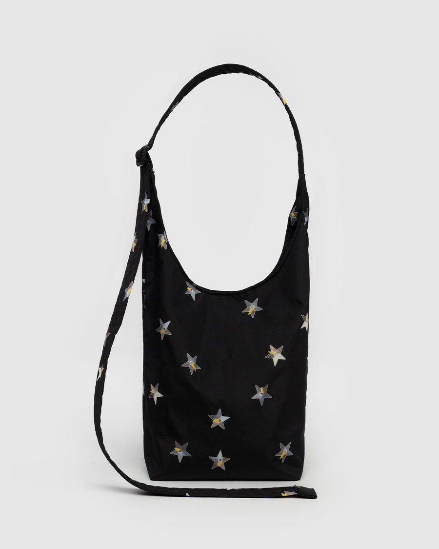 black small sling bag with metallic star print