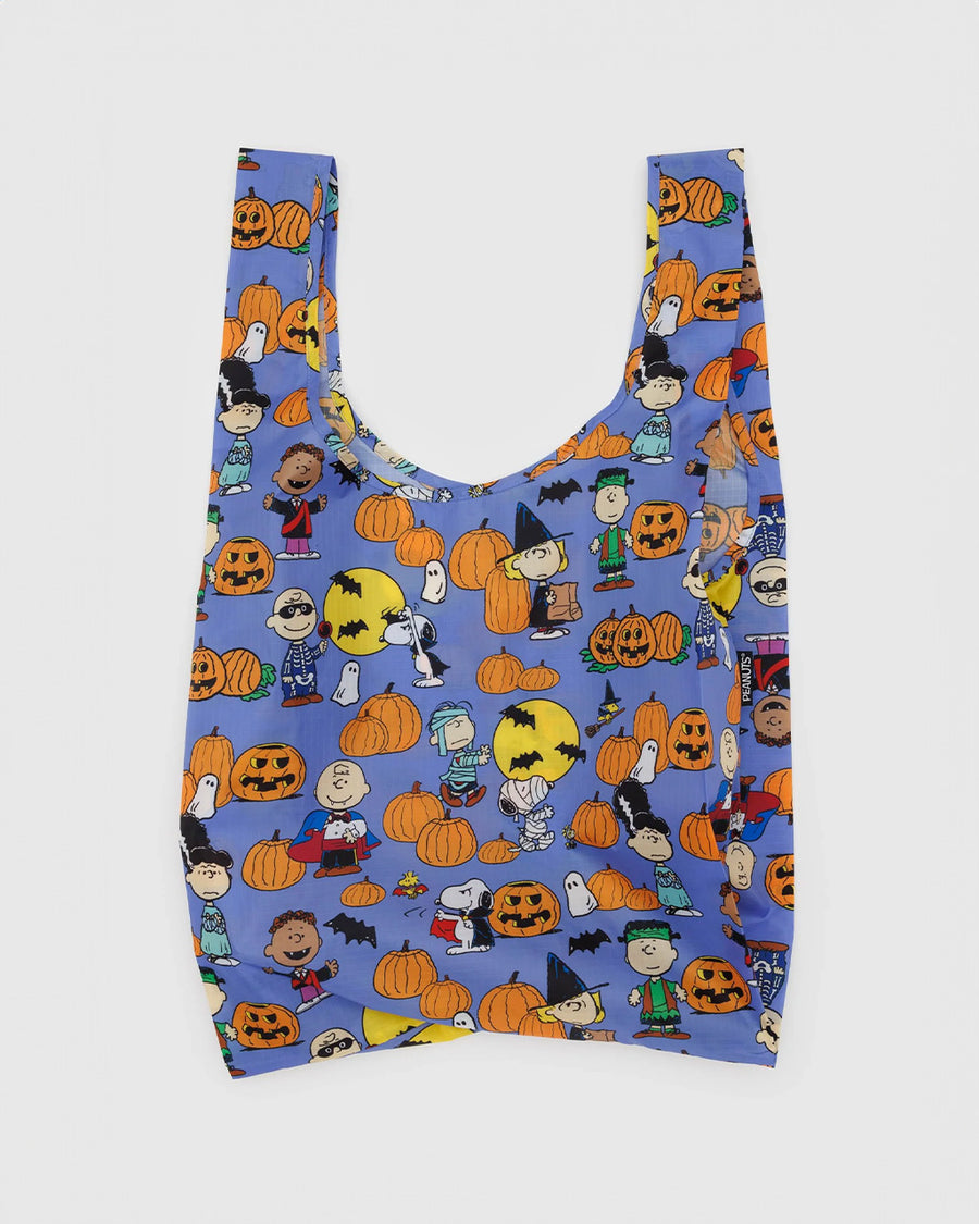 blue standard baggu with peanuts characters in halloween costumes and surrounded by jack o'lanterns and pumpkin