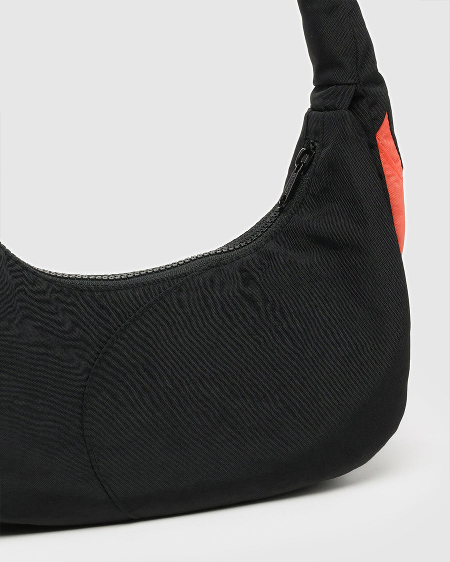 up close of black swan shoulder bag