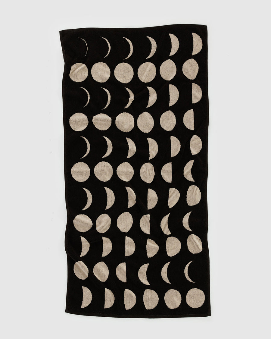 reversible black bath towel with cream moon phases