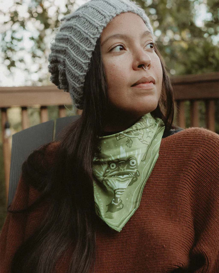 model wearing green square bandana with fiddling frog print