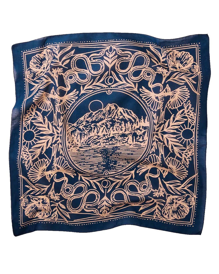 blue square bandana with pink mountain scene and floral print