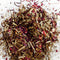 up close of loose leaf pink hibiscus tea