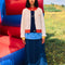 model wearing cream knit cardigan with yellow sleeve cuffs, coral trim and navy button front with embroidered couple on bust