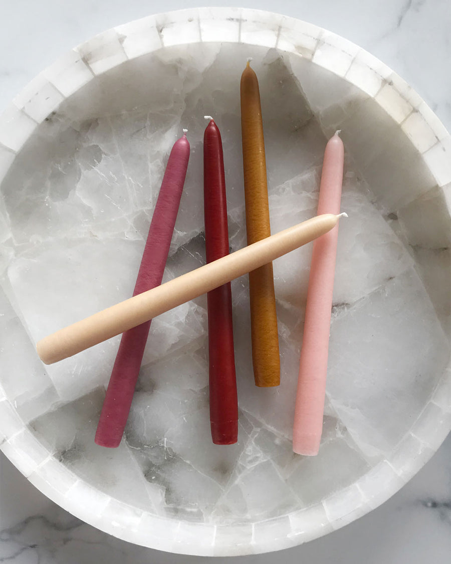 set of 5 zodiac tapers in a bowl