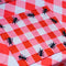 pink and white plaid placemat with black ant border