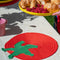 tomato shaped placemat on a table