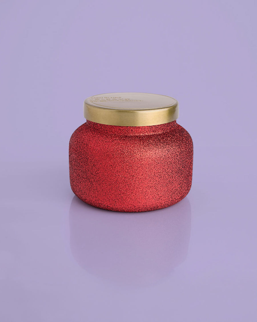 19 oz. red glitter candle with gold lid