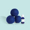 set of three blue dryer balls with volcano essential oil