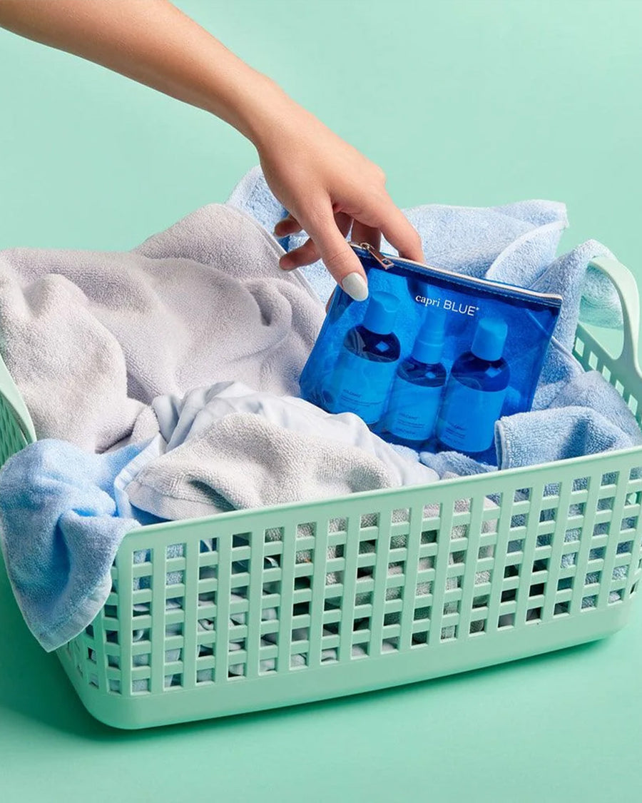 laundry gift set with Concentrated Laundry Detergent, Fabric Softener and Wrinkle Release in a basket