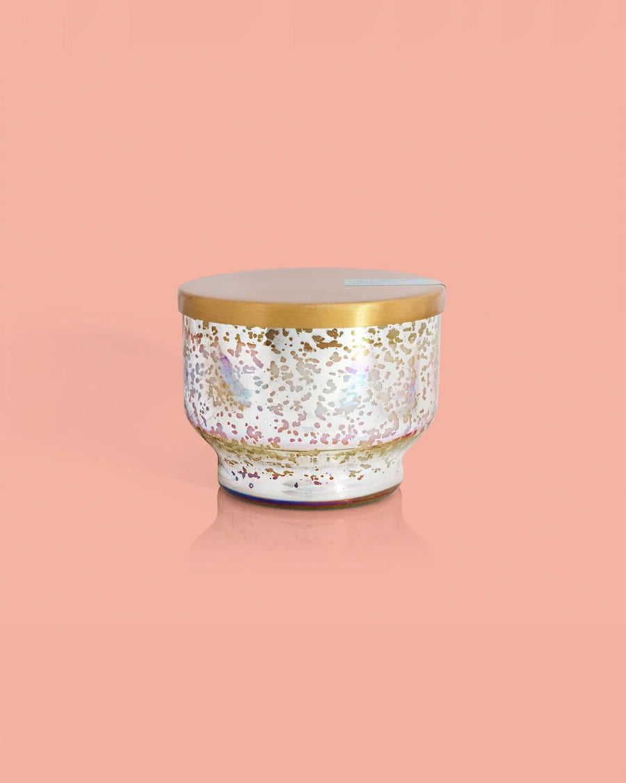 gold and white iridescent inverted candle