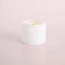 lit white textured opal candle with matching lid