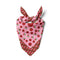 folded and tied pink and red cotton silk bandana with all over tomato print