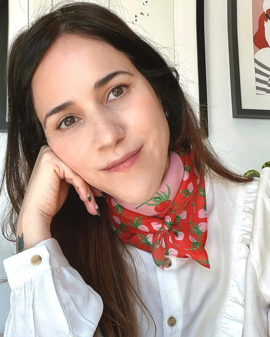 model wearing pink and red cotton silk bandana with all over tomato print