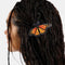 model wearing realistic monarch butterfly hair barrette