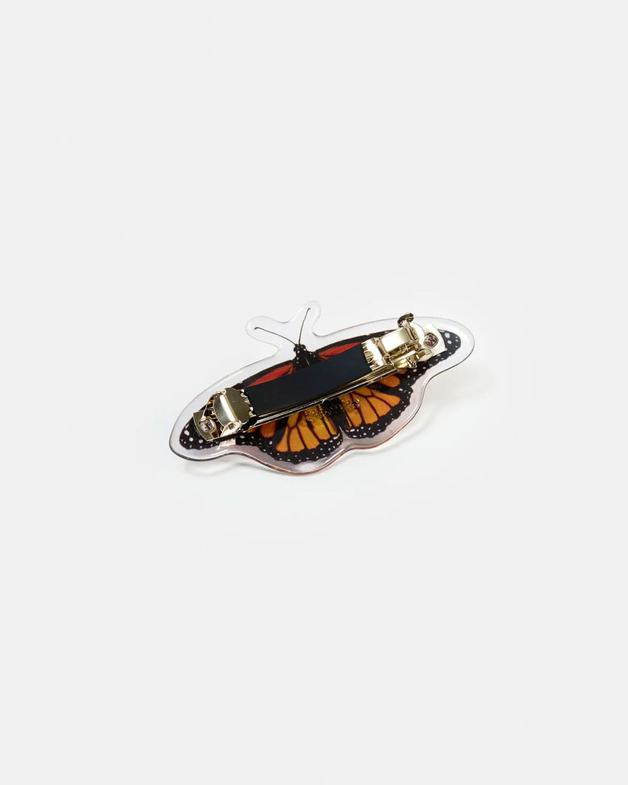 back view of realistic monarch butterfly hair barrette