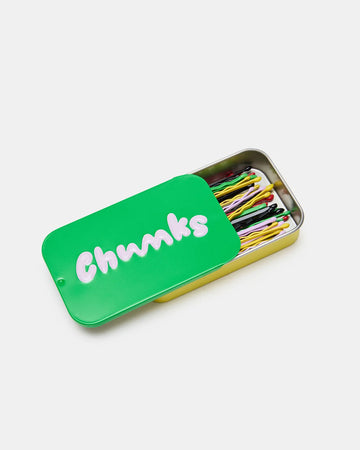 green tin of colorful bobby pins