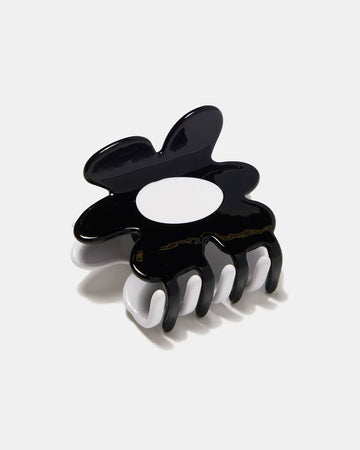 black and white flower shaped hair claw